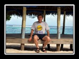 Jim relaxing at a beach fale.